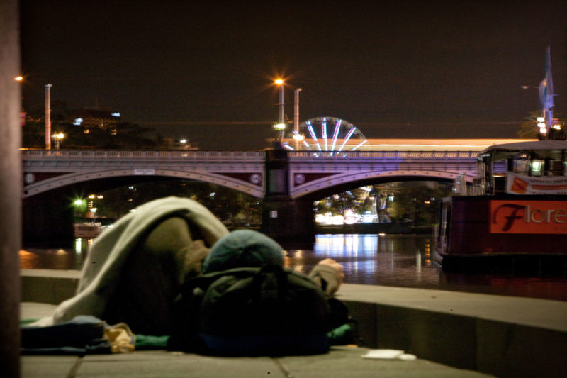 Homeless Person and City Skyline Homeless Person