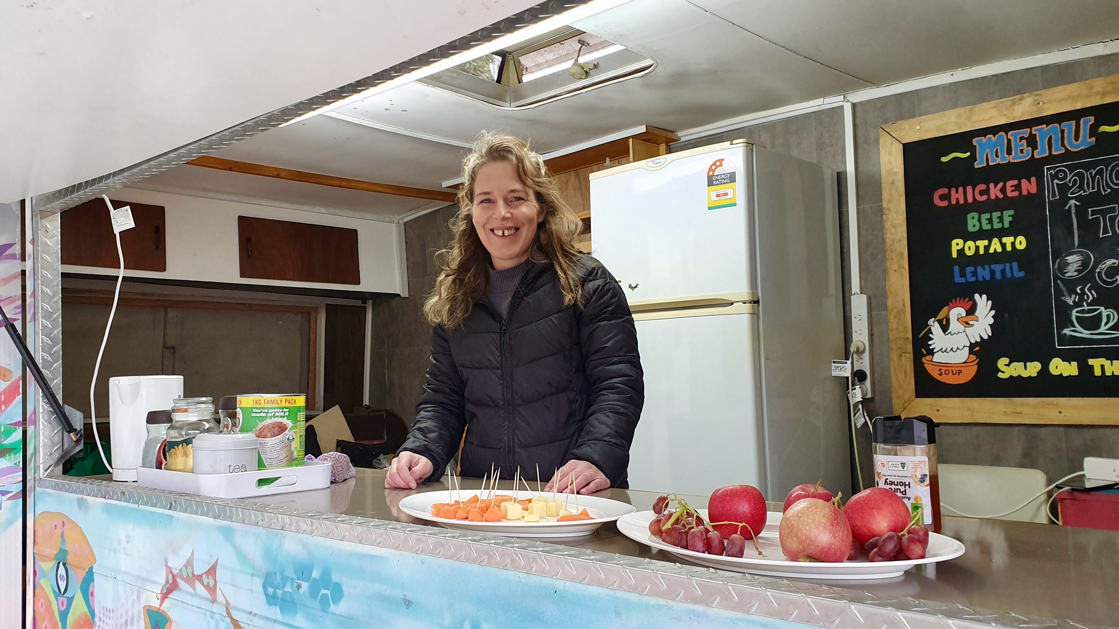 Sharon working in Caravan outside